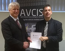 Navcis Head of Unit DCI Gordon Roberts Presents Automatrics National Police Partner Agreement to Automatrics MD Richard Taylor 